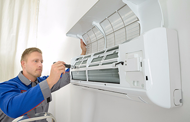 Professional repairing air conditioner in Springvale